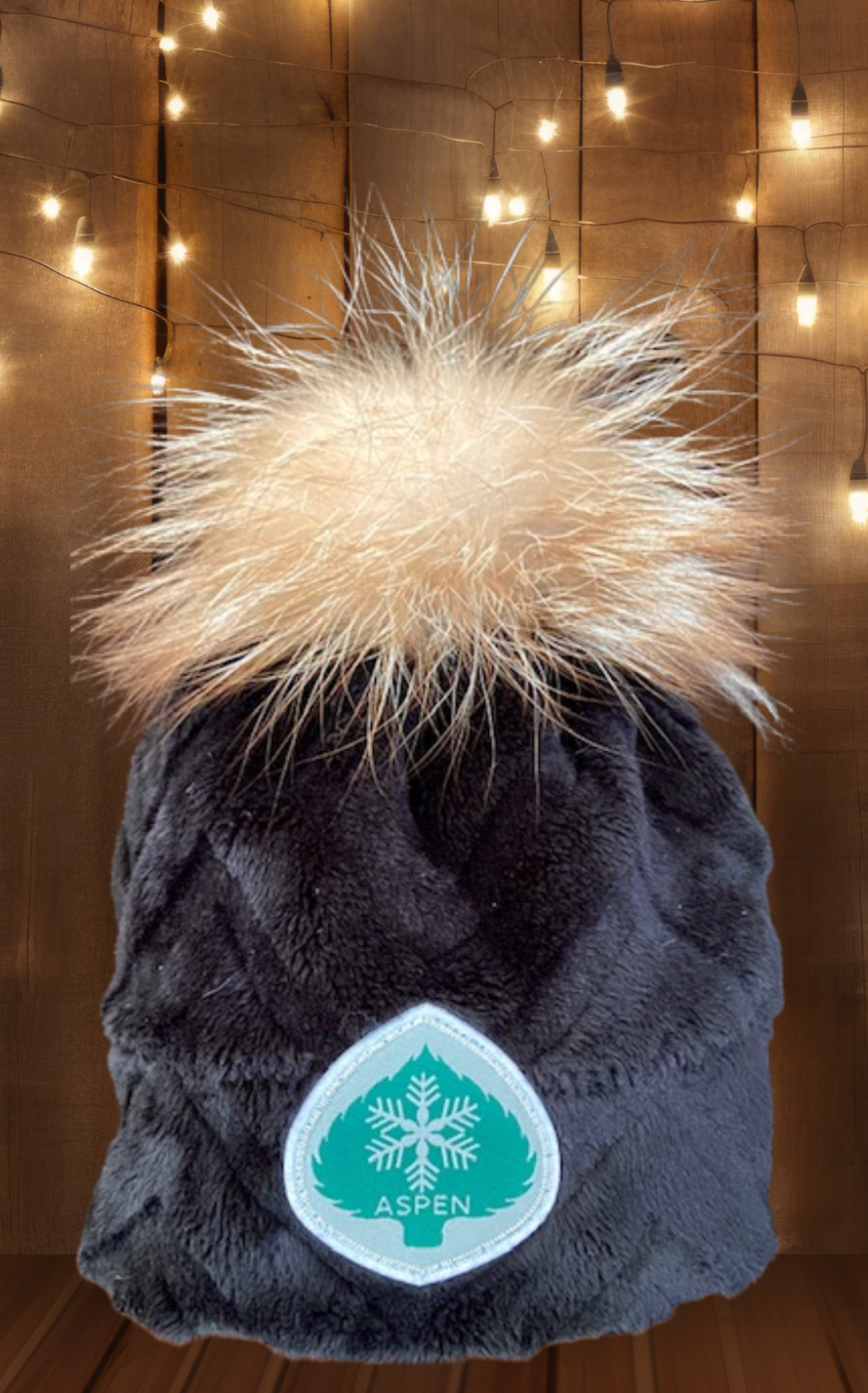 Design a piece of ski history.  Pick a vintage ski patch, pick a hat color, pick a fur pom